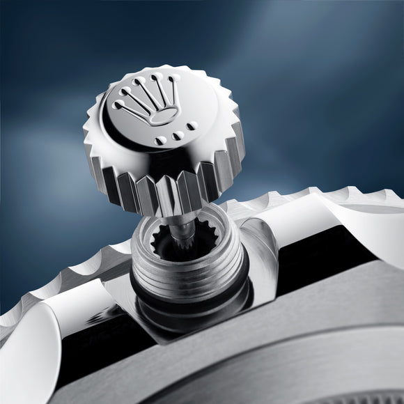 A close up of the Rolex Submariner's triplock winding crown. These crowns help ensure a waterproofness of 300M on the Rolex Submariners.