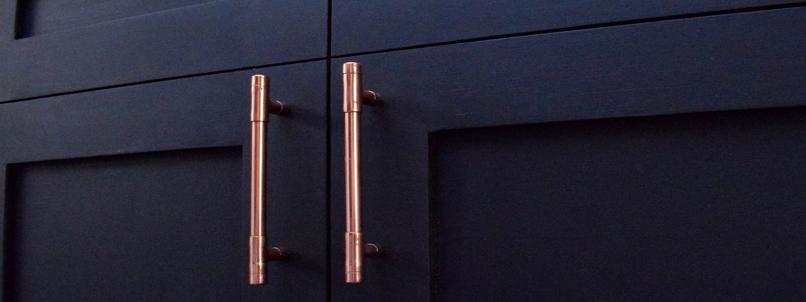 copper handles on cabinets