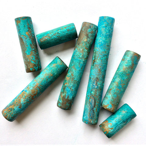 copper verdigris blue green patina texture on copper pipe