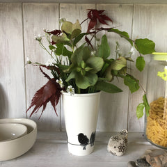 hellebore seed heads in starling vase