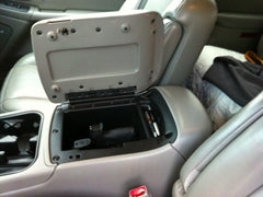 handgun mounted in chevy avalanche angle 1 console box