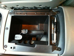 handgun mounted in chevy avalanche angle 1 console box