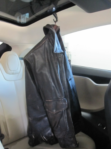 Tesla Model S coat hook in use