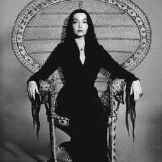 a morticia peacock chair is what you need in your life