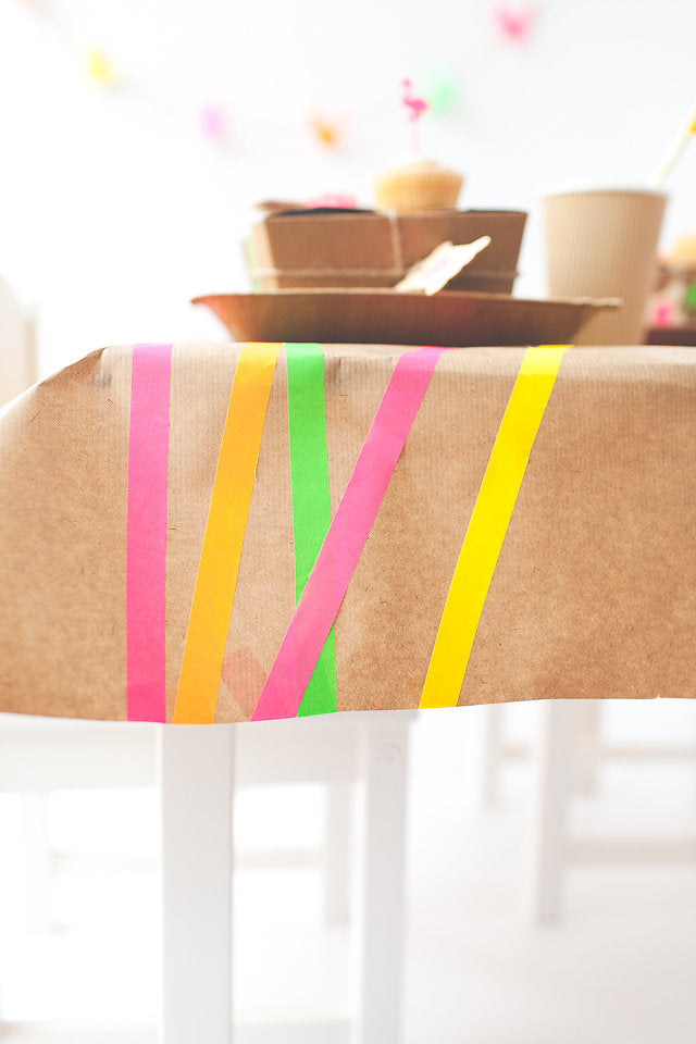 upcycle wrapping paper to make tablecloths