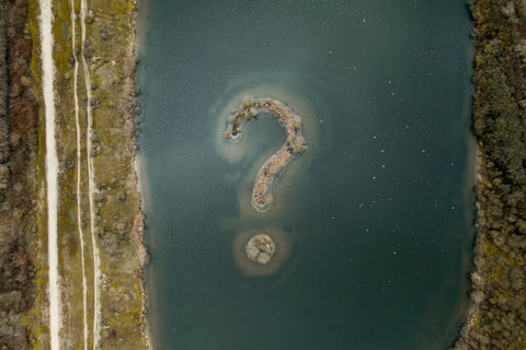 Question mark on water
