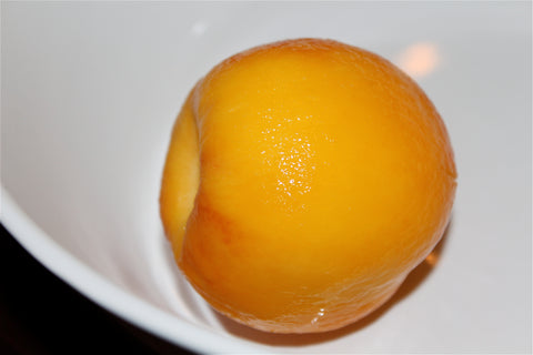 A peach that has had its skin removed