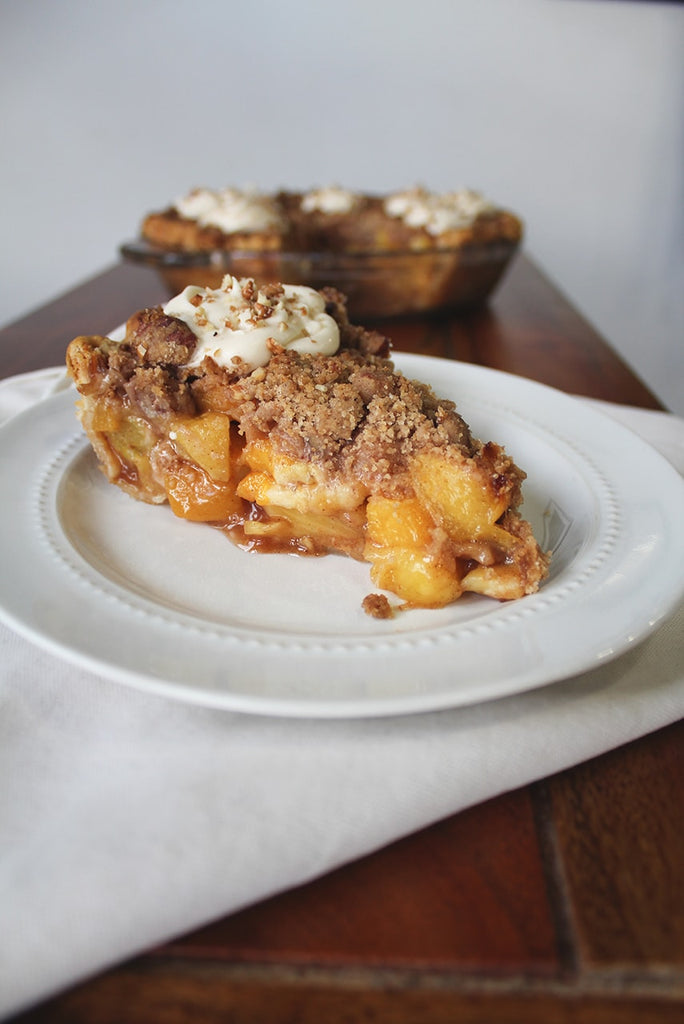 Crumbly peach hummingbird pie slice