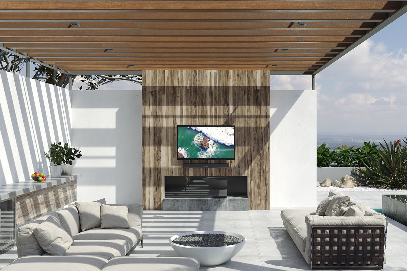 Outdoor TV Idea - Beautiful patio with outdoor TV mounted on wall