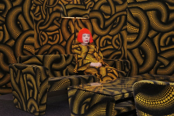 Yayoi Kusama in 'Yellow Tree' furniture room at Aichi Triennale, 2010