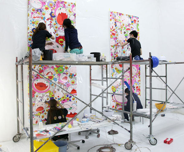 Young assistants at work in Kai Kiki Co., Takashi Murakami's studio factory