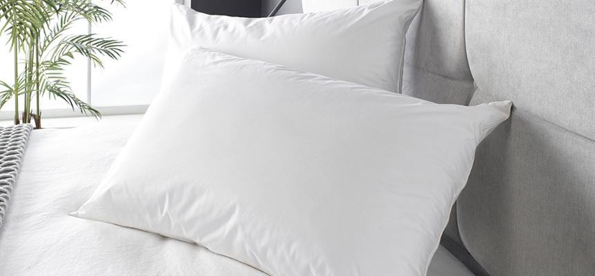 White pillows on a bed