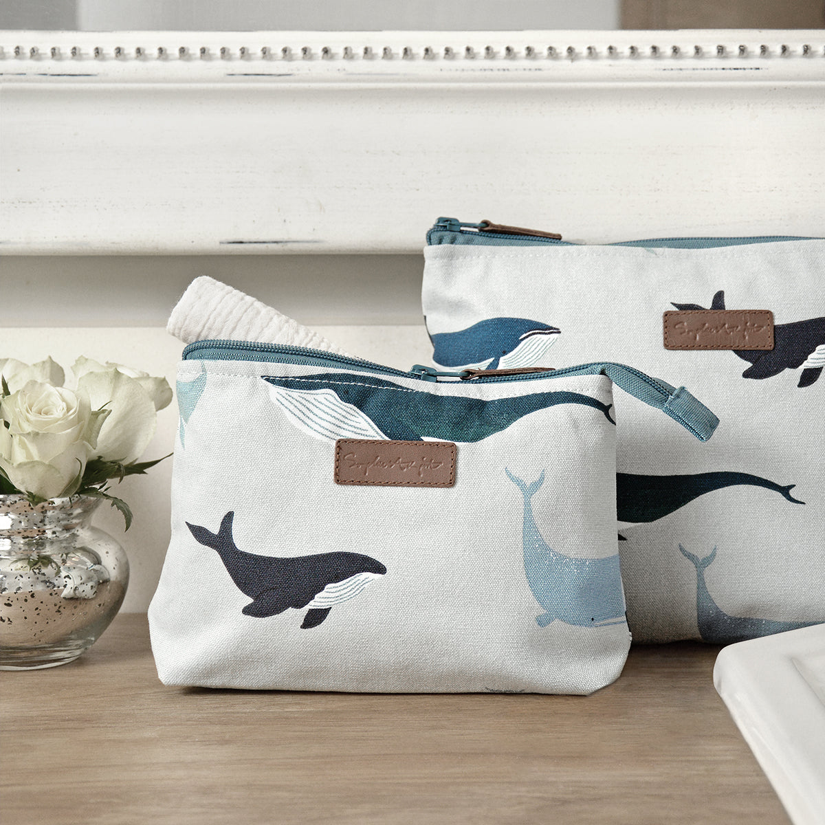 Whales make up and wash bag by Sophie Allport