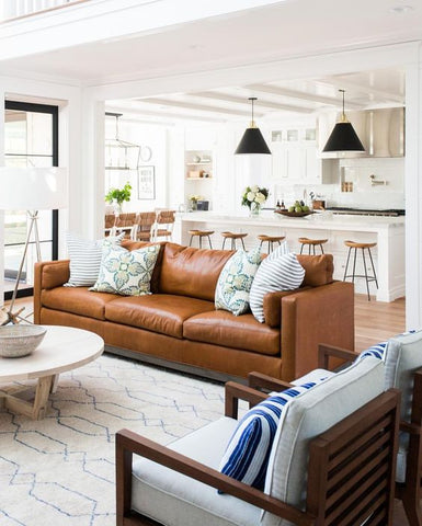 Earthy colours and soft fabrics make this modern farmhouse living room cosy