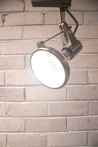 This LED track light with swivel arm oozes old school styling with its retro feel and bare lamp holder. It has an adjustable supporting arm for different bulb lengths and a robust metal housing for the lamp holder. It