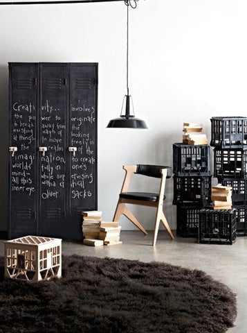 the crates offer a nice, industrial touch, and the pendant light puts the nostalgia in this seemingly youthful closet space