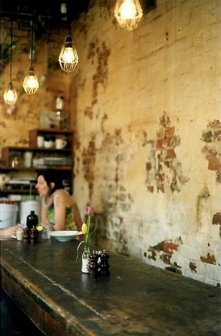 vintage-inspired cafe interior using cage lighting image via pinterest