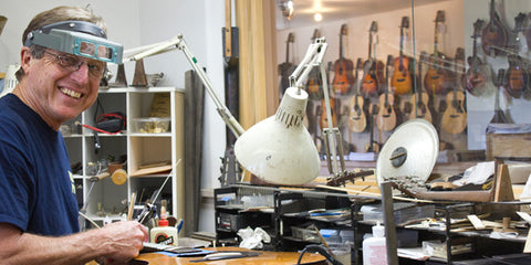 Jim Baggett working at his luthiery bench