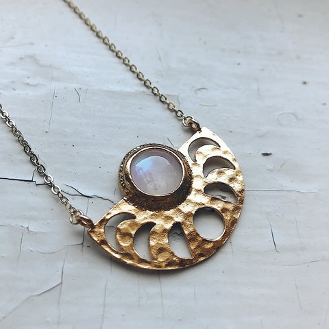 Moon goddess necklace with lunar phases and rainbow moonstone in gold tone