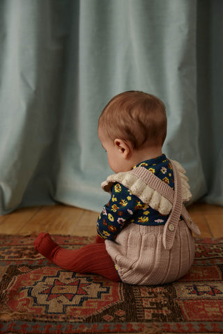 The classic Misha & Puff Ruffle Romper is back this season in a lovely pink and sage combination.  Paired with our collegian tights for all winter long.  You will adore this baby clothing style.