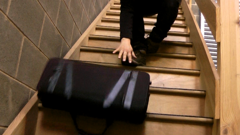 Bag falling down the stairs