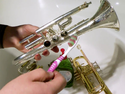 Use toothbrush to clean your cornet