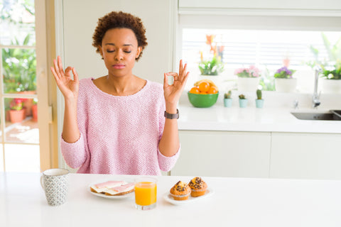 Mindful eating, without distractions, can improve digestion and reduce stress. 