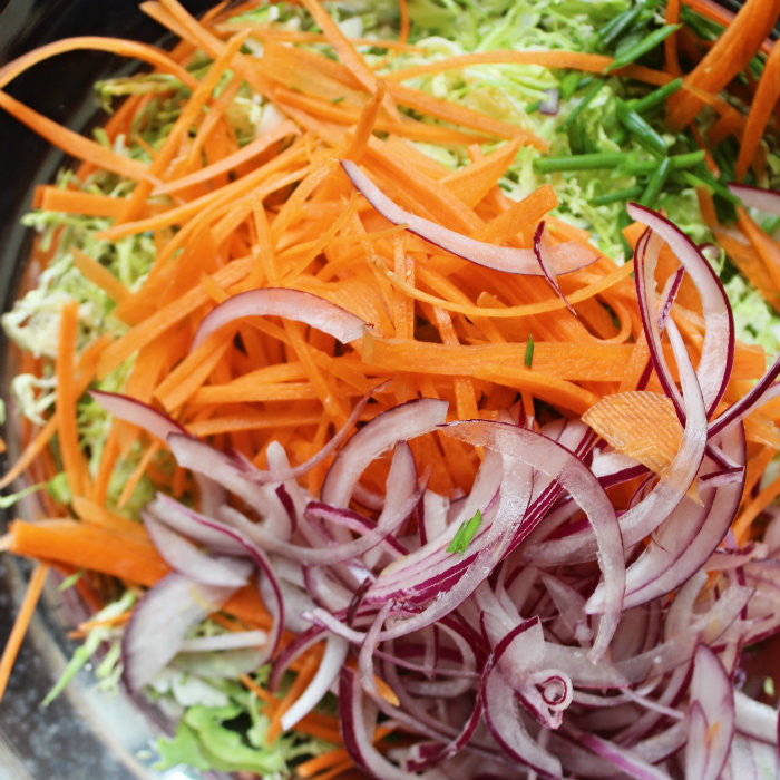 Brussels Sprout and Carrot Slaw with Orange Poppyseed Dressing