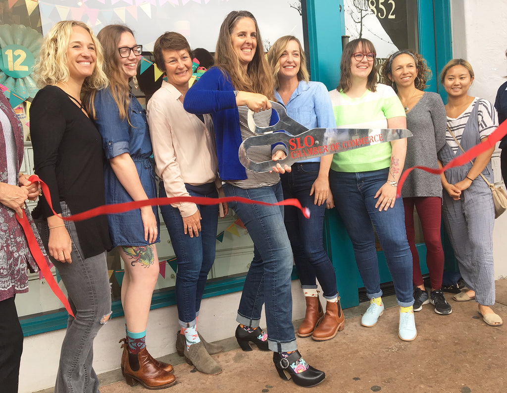 The Sock Drawer staff attend a ribbon cutting for the SLO Chamber of Commerce