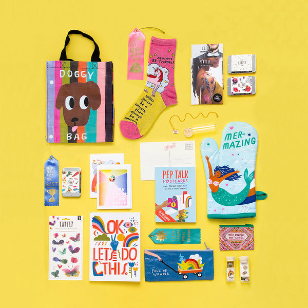 A variety of fun gift products like tote bags, oven mitts, journals, jewelry and temporary tattoos