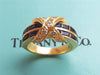 Tiffany 'X' ring, in gold, diamond & sapphire
