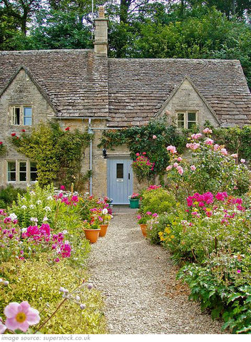 country garden with gravel path and flowers