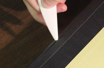 Sticking Tape in Book Gusset with Bone Folder