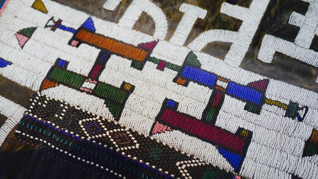 Marriage aprons by unknown Ndebele artists, in glass beads on hide