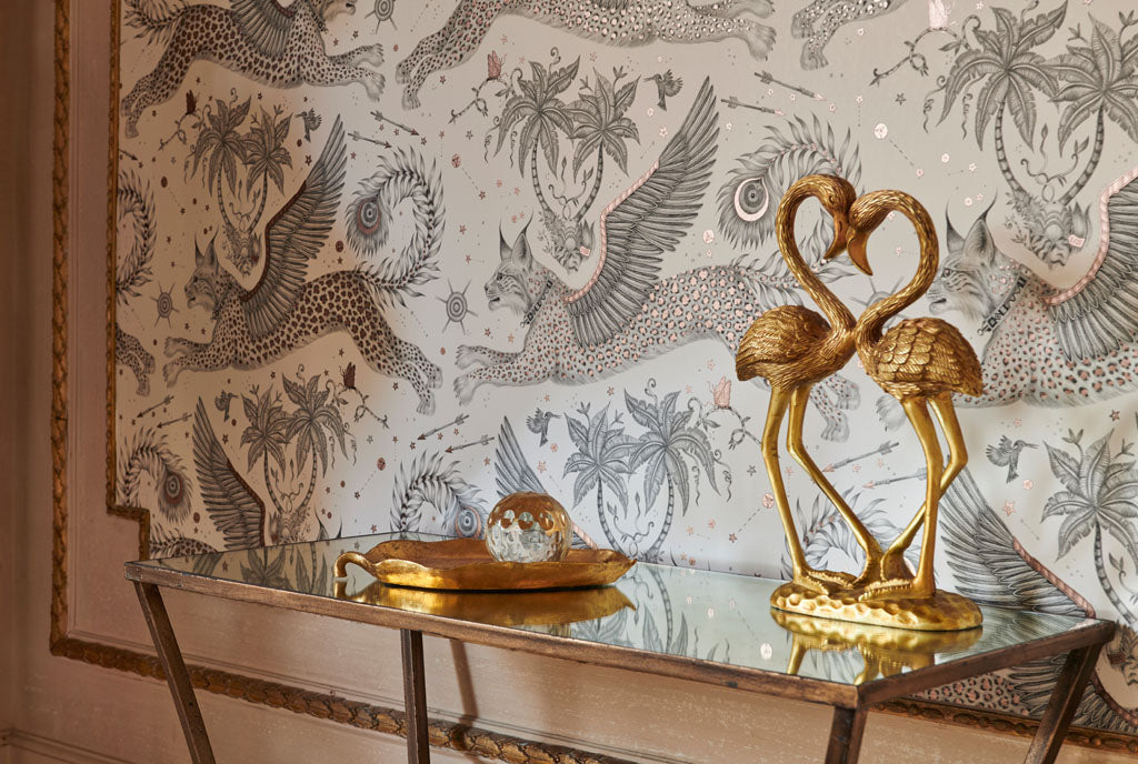 The Nude Lynx Wallpaper with metallic details that shimmer when they catch the light, is sure to add a touch of luxury to your interior. Featuring a mystical winged Lynx with a magical peacock tail leaping through a starry night sky. 