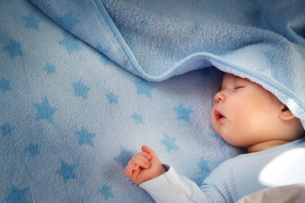 training baby to sleep in bassinet