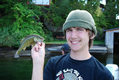Blake with one of his first fish ever on the fly rod… a little smallmouth that ate a orange Crazy Dad.