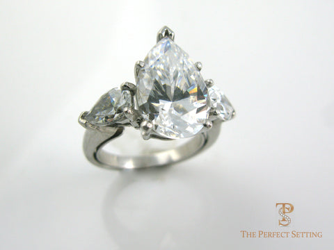 3 stone pear engagement rings