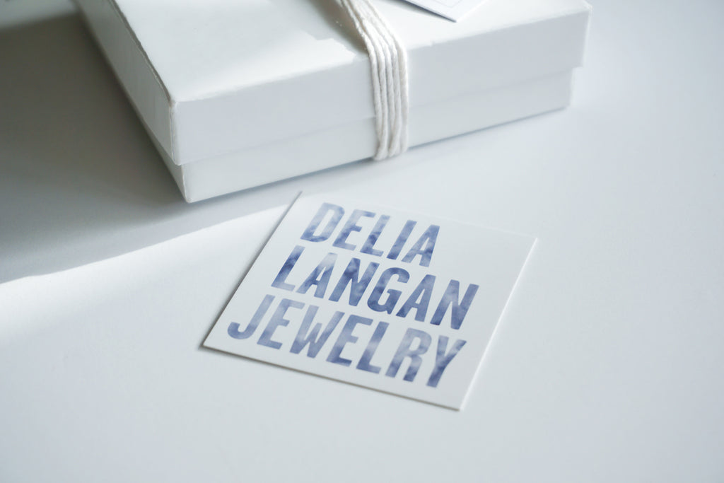 delia langan jewelry gift box and logo