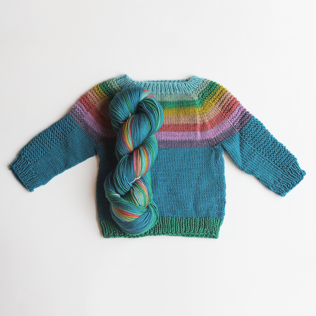 Self-striping rainbow baby sweater knitting | Gauge Dye Works