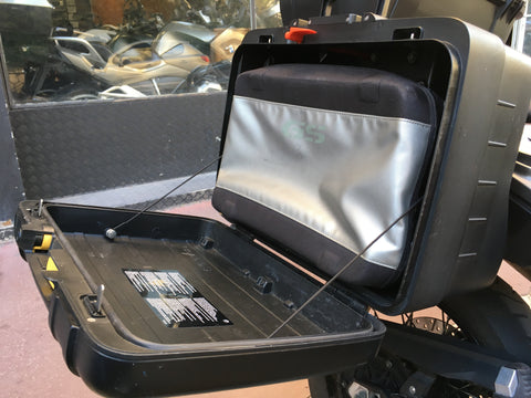 motorcycle rental storage side case F800 GS open with inner bag