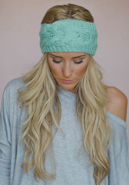 Front view of model in mint green crochet headwrap