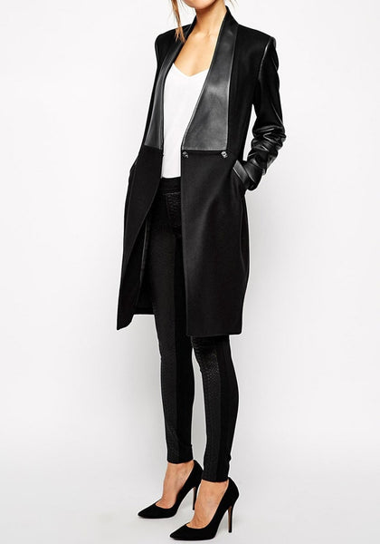 Full_front_view_of_girl_in_black_PU_leather_sleeve_coat