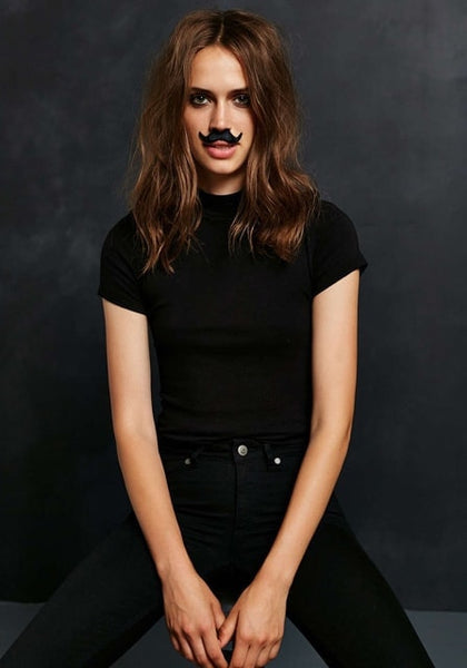 Girl with a fake mustache