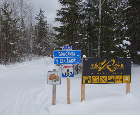 Snowmobile trail signs Gold Rush Tour