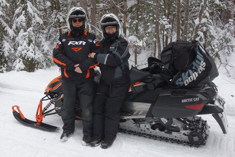Karen Richardson and her husband snowmobiling