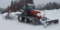 Snowmobile trail groomer