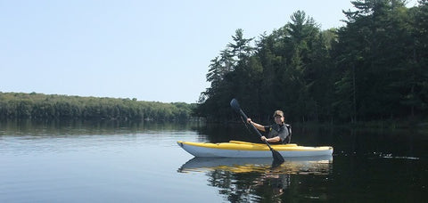Karen Richardson kayaking on Brownlee Lake, east of Lake Superior, Ontario