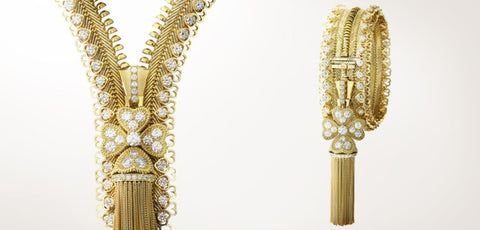 AN ICONIC RETRO GOLD, RUBY AND DIAMOND 'ZIP' NECKLACE, VAN CLEEF