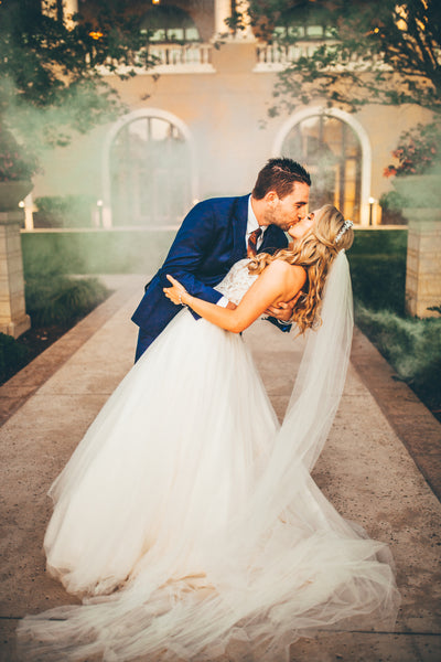 Bride and groom kiss